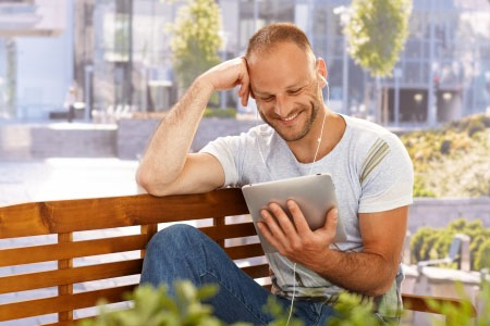 Man reading iPad